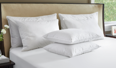 Experience Luxury Comfort: The Ultimate Hotel Suite Down Pillow